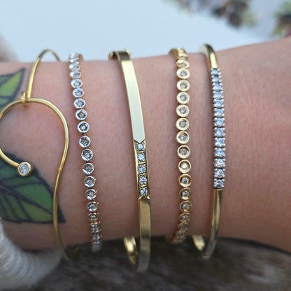 Vintage 14k gouden bangle armband met 13 diamanten