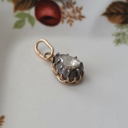 Antique 14k gold and silver pendant with a pear-shaped rose-cut diamond