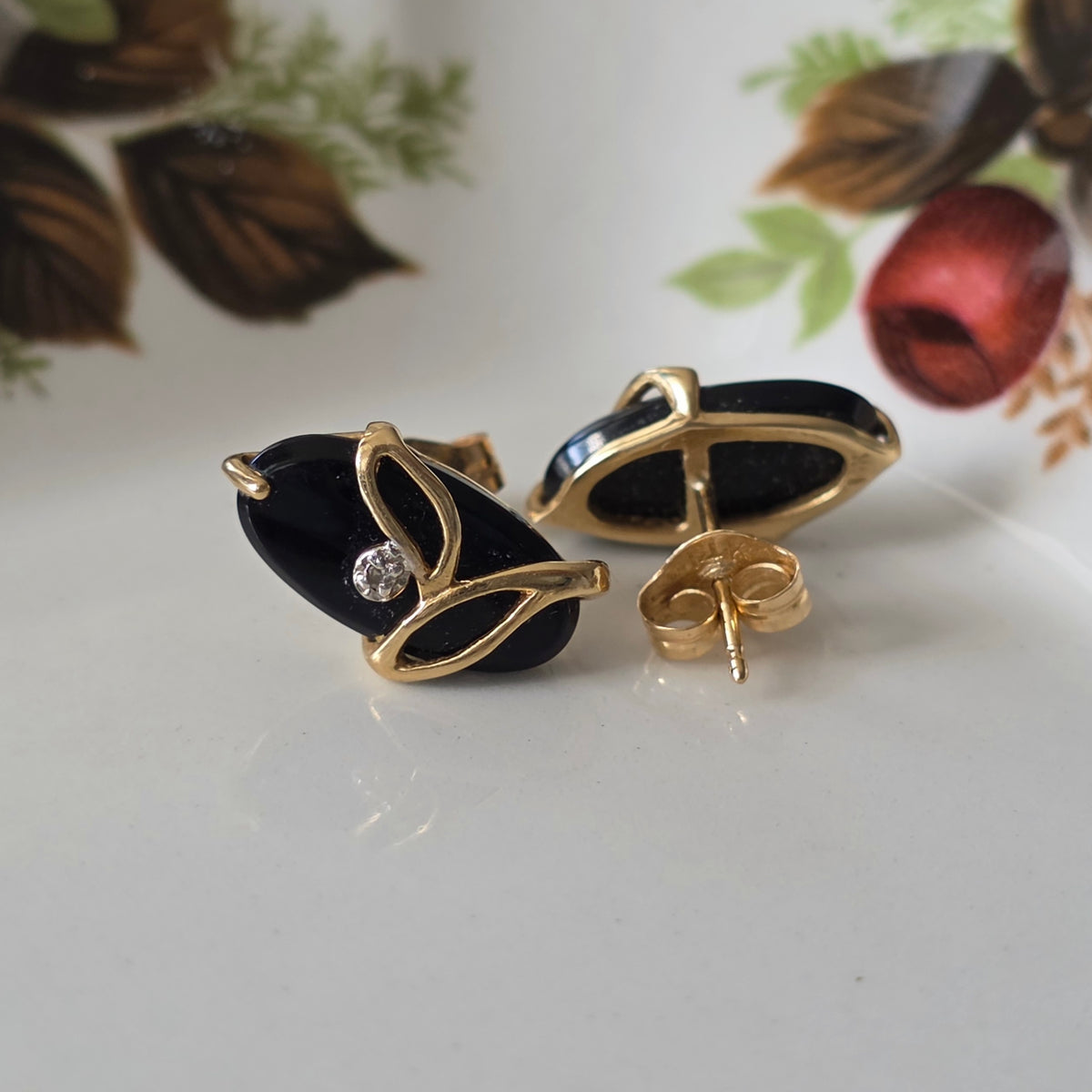 Vintage 14k gouden oorstekers met onyx en diamant