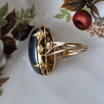 Vintage 14k gouden ring met hematiet en bloemen