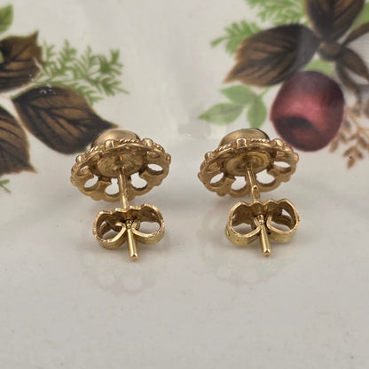 Vintage 14k gouden oorstekers granaat bloem