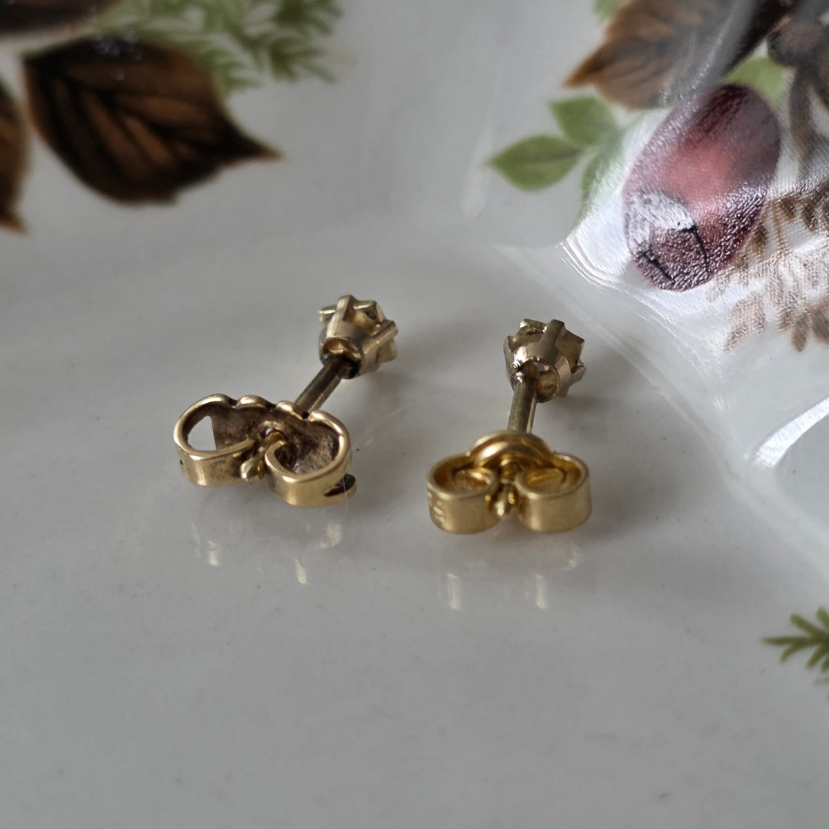 Vintage 14k gouden oorstekers met diamant ster 0.02ct