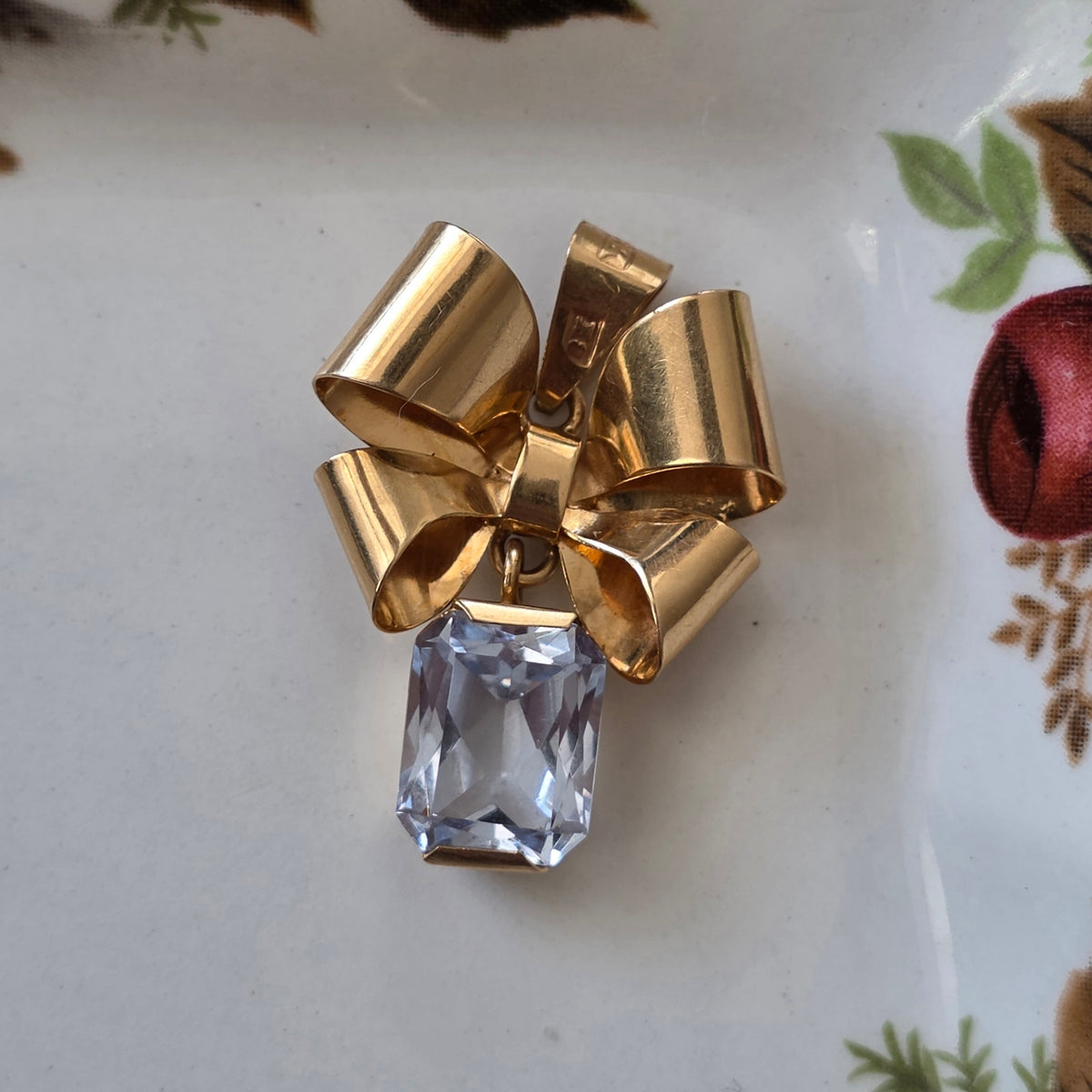 Vintage 18k gouden hanger strik met aquamarijn