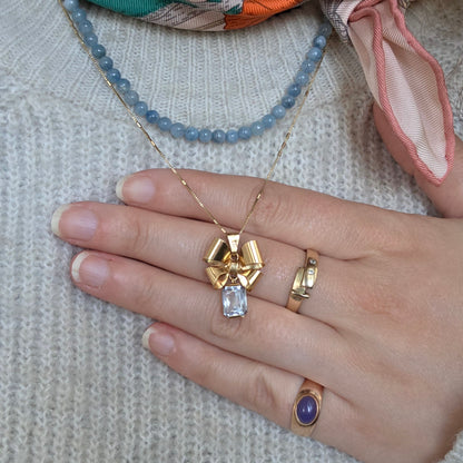 Vintage 18k gouden hanger strik met aquamarijn