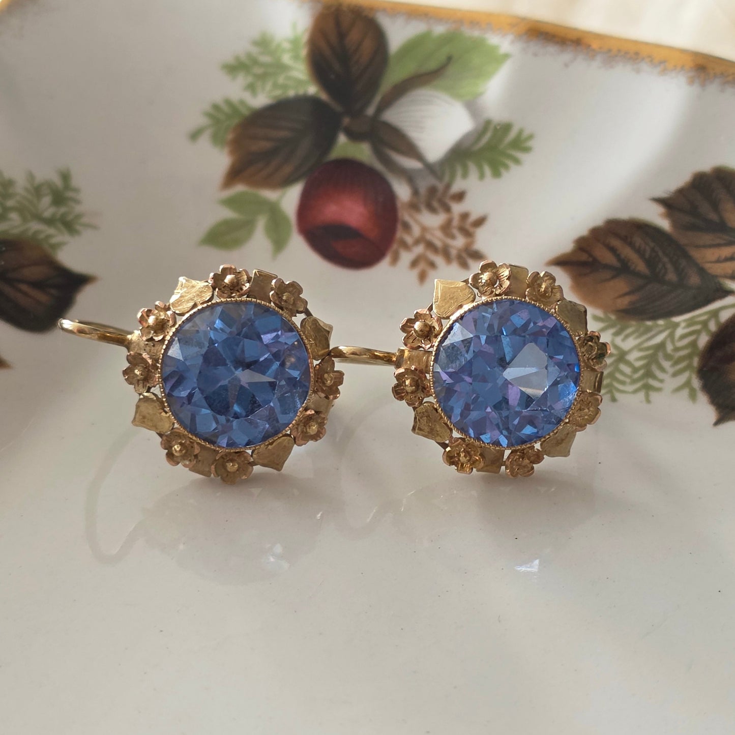 Vintage 14k gold earrings with topaz and flower details