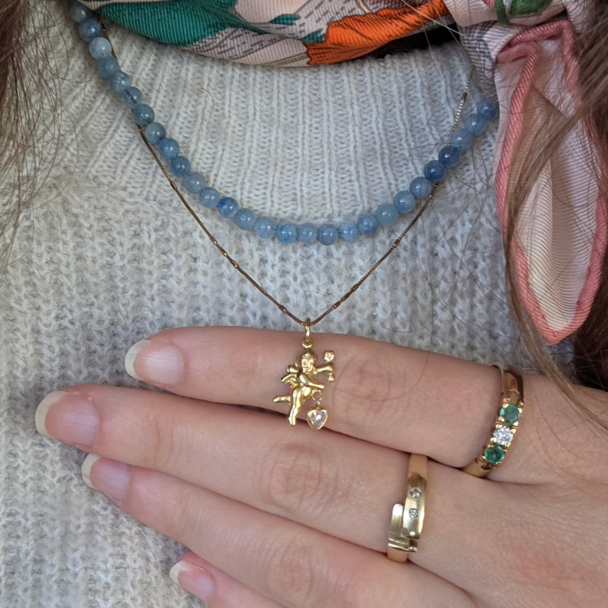 Vintage 18k gold Cupid pendant