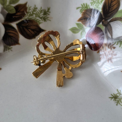 Antieke 14k gouden strik broche met roosdiamanten