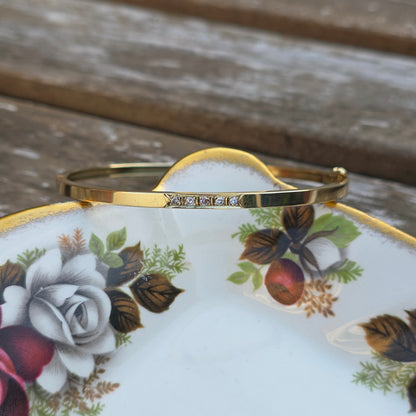 Vintage 14k gouden bangle armband met 5 diamanten