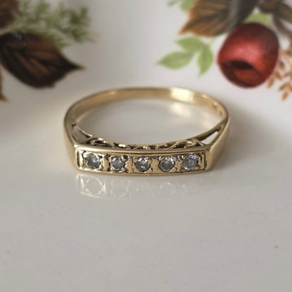 Vintage 14k gouden ring met diamanten en krullen