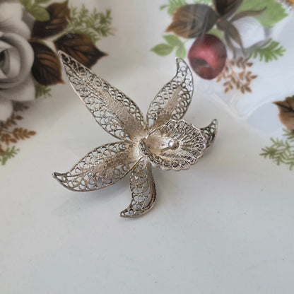 Antique silver filigree orchid brooch