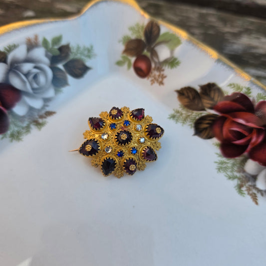 Antieke 14k broche klederdracht granaat