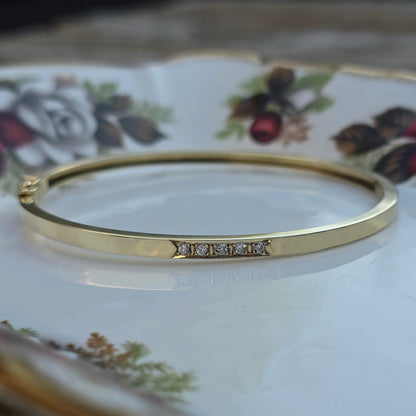 Vintage 14k gouden bangle armband met 5 diamanten