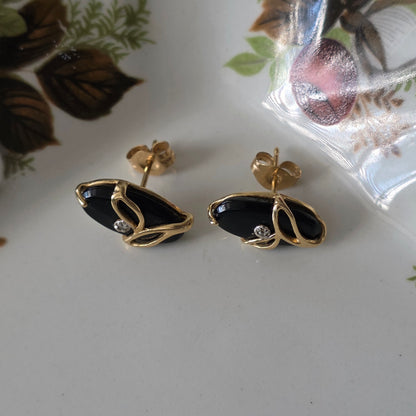 Vintage 14k gouden oorstekers met onyx en diamant