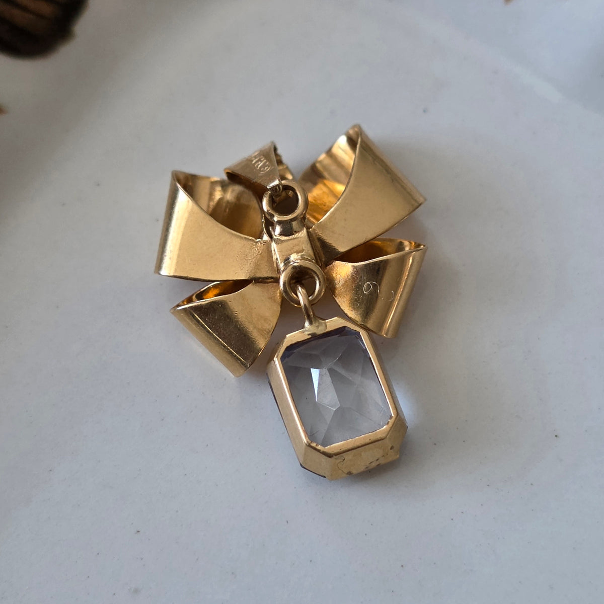 Vintage 18k gouden hanger strik met aquamarijn