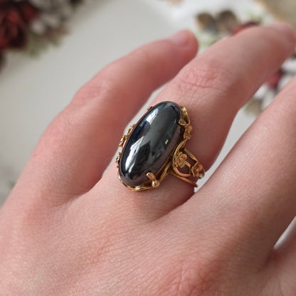 Vintage 14k gouden ring met hematiet en bloemen