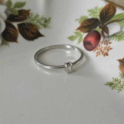 Vintage 14k witgouden ring met diamant baguette