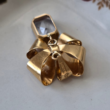 Vintage 18k gouden hanger strik met aquamarijn
