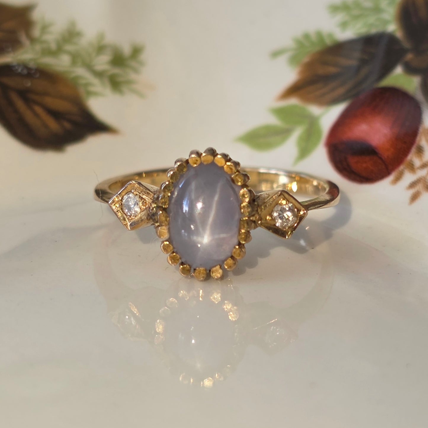 Vintage 14k gouden ring met ster saffier en diamanten
