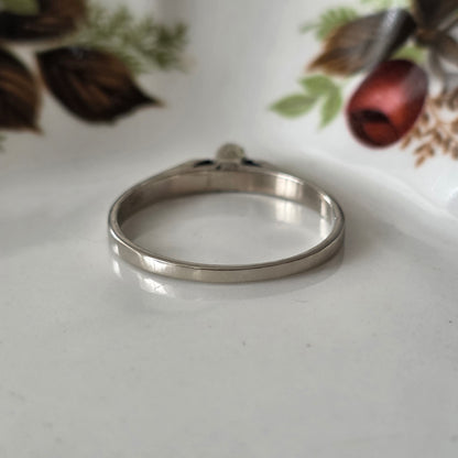 Vintage 14k witgouden verlovingsring met solitair diamant 0,06ct