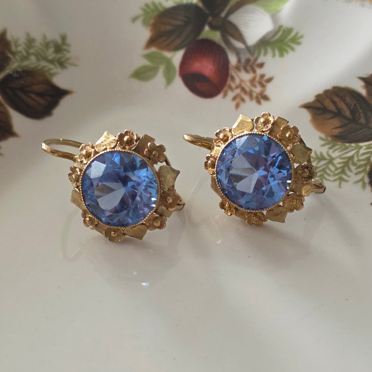 Vintage 14k gold earrings with topaz and flower details
