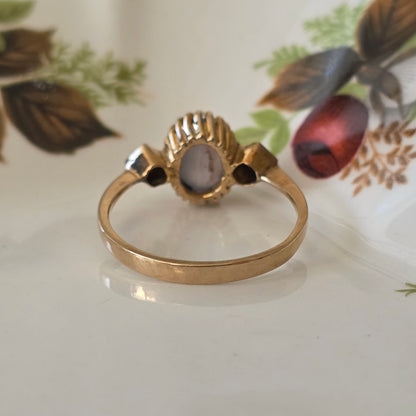 Vintage 14k gouden ring met ster saffier en diamanten