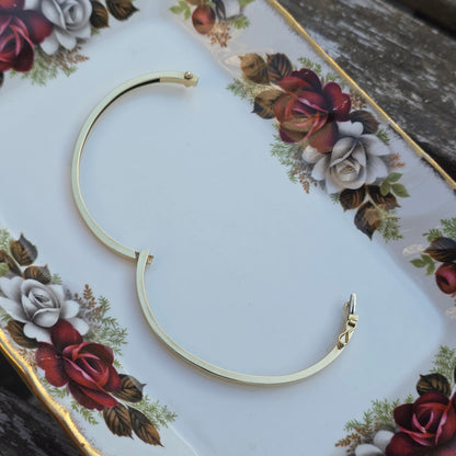 Vintage 14k gouden bangle armband met 5 diamanten