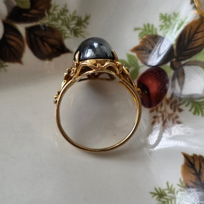 Vintage 14k gouden ring met hematiet en bloemen