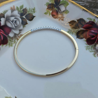 Vintage 14k gouden bangle armband met 13 diamanten