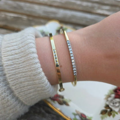 Vintage 14k gouden bangle armband met 13 diamanten