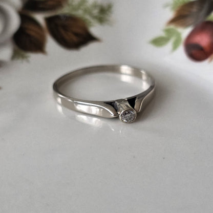 Vintage 14k witgouden verlovingsring met solitair diamant 0,06ct
