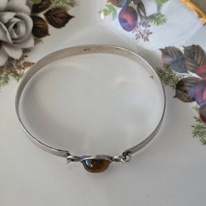 Vintage zilveren bangle tijgeroog