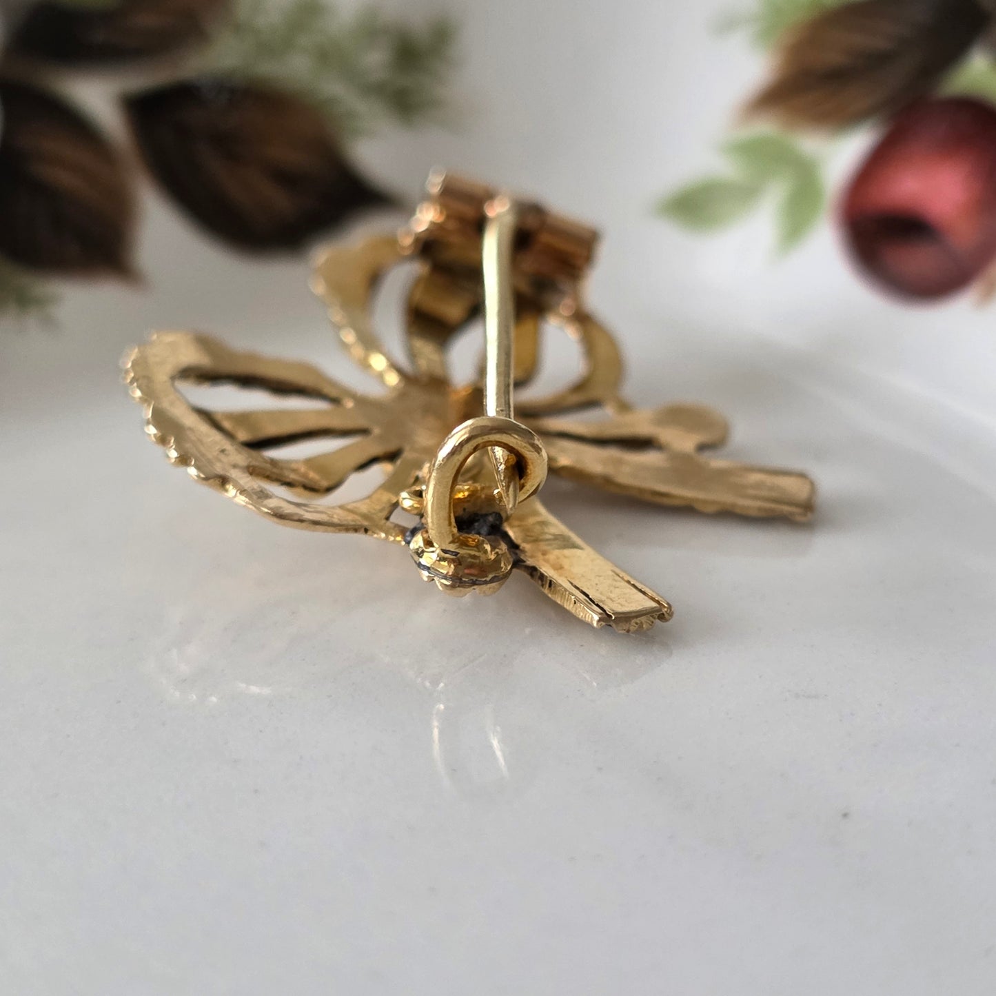 Antieke 14k gouden strik broche met roosdiamanten