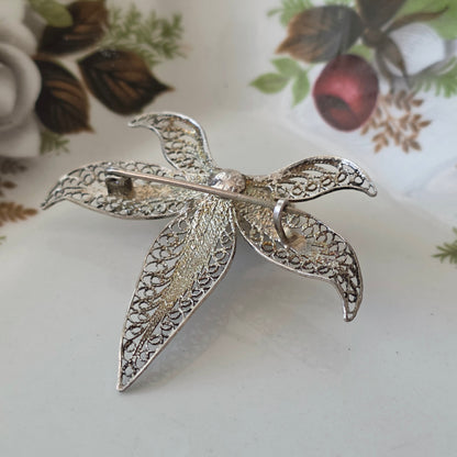 Antique silver filigree orchid brooch