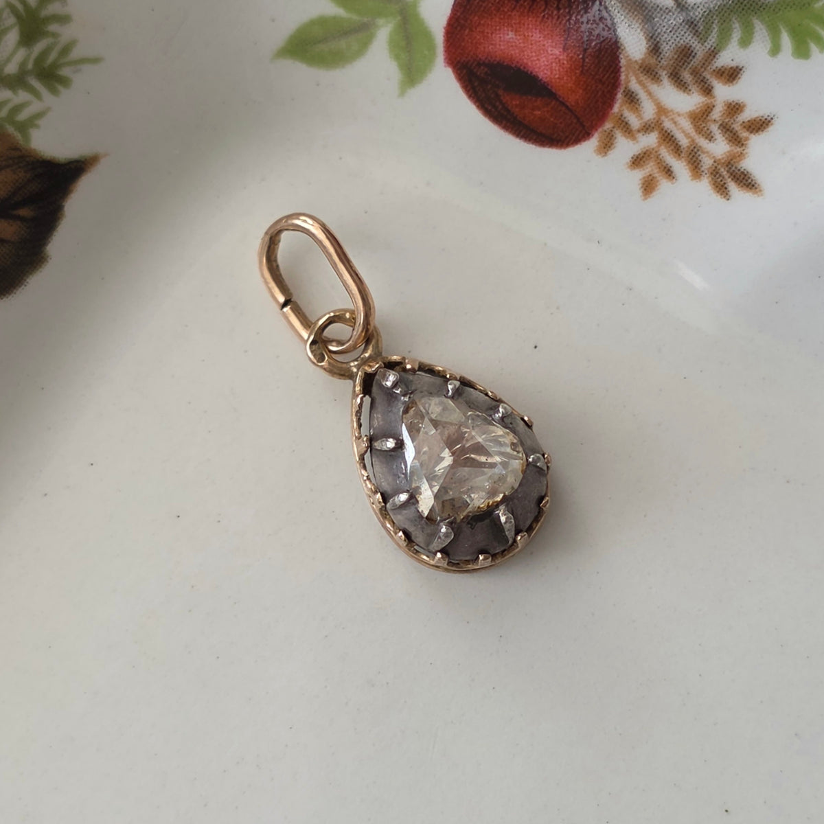 Antique 14k gold and silver pendant with a pear-shaped rose-cut diamond