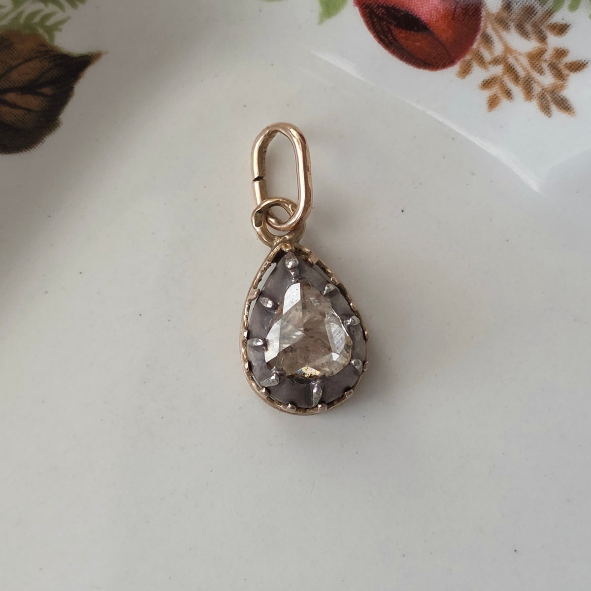 Antique 14k gold and silver pendant with a pear-shaped rose-cut diamond