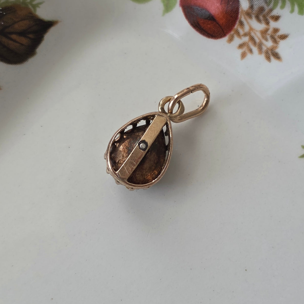 Antique 14k gold and silver pendant with a pear-shaped rose-cut diamond