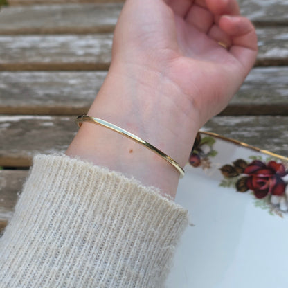 Vintage 14k gouden bangle armband met 13 diamanten