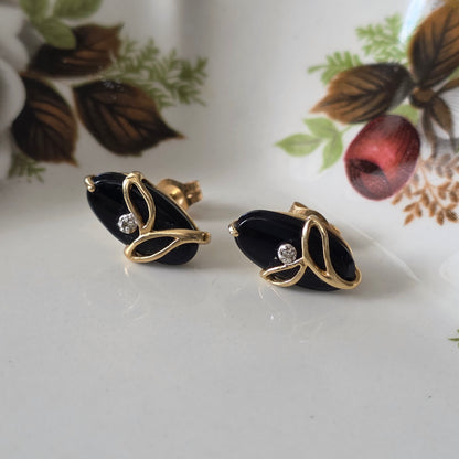 Vintage 14k gouden oorstekers met onyx en diamant