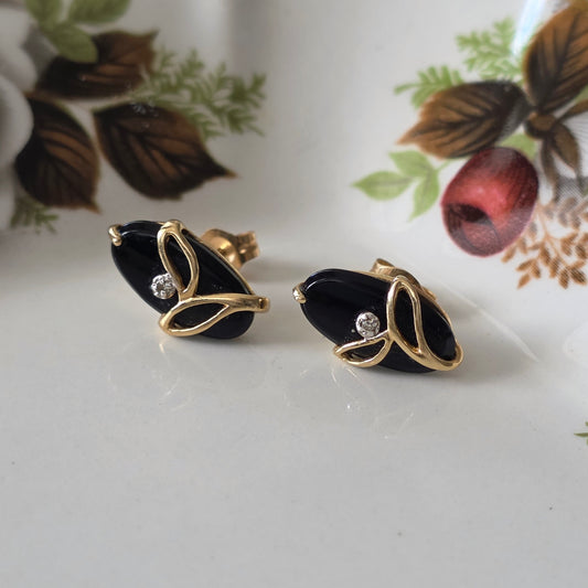 Vintage 14k gouden oorstekers met onyx en diamant