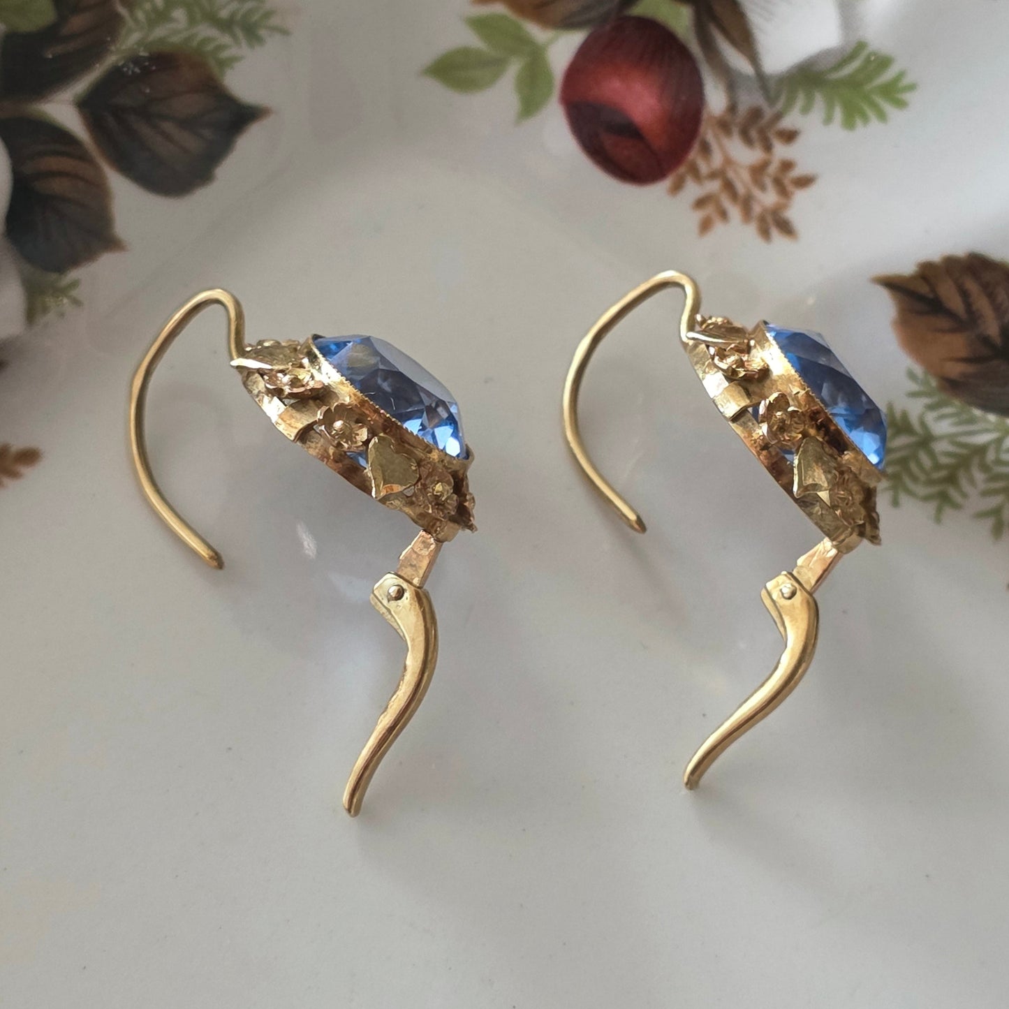 Vintage 14k gold earrings with topaz and flower details