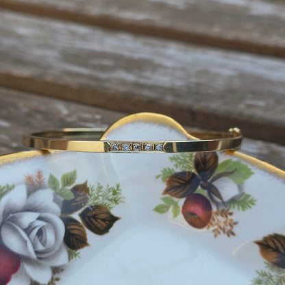 Vintage 14k gouden bangle armband met 5 diamanten