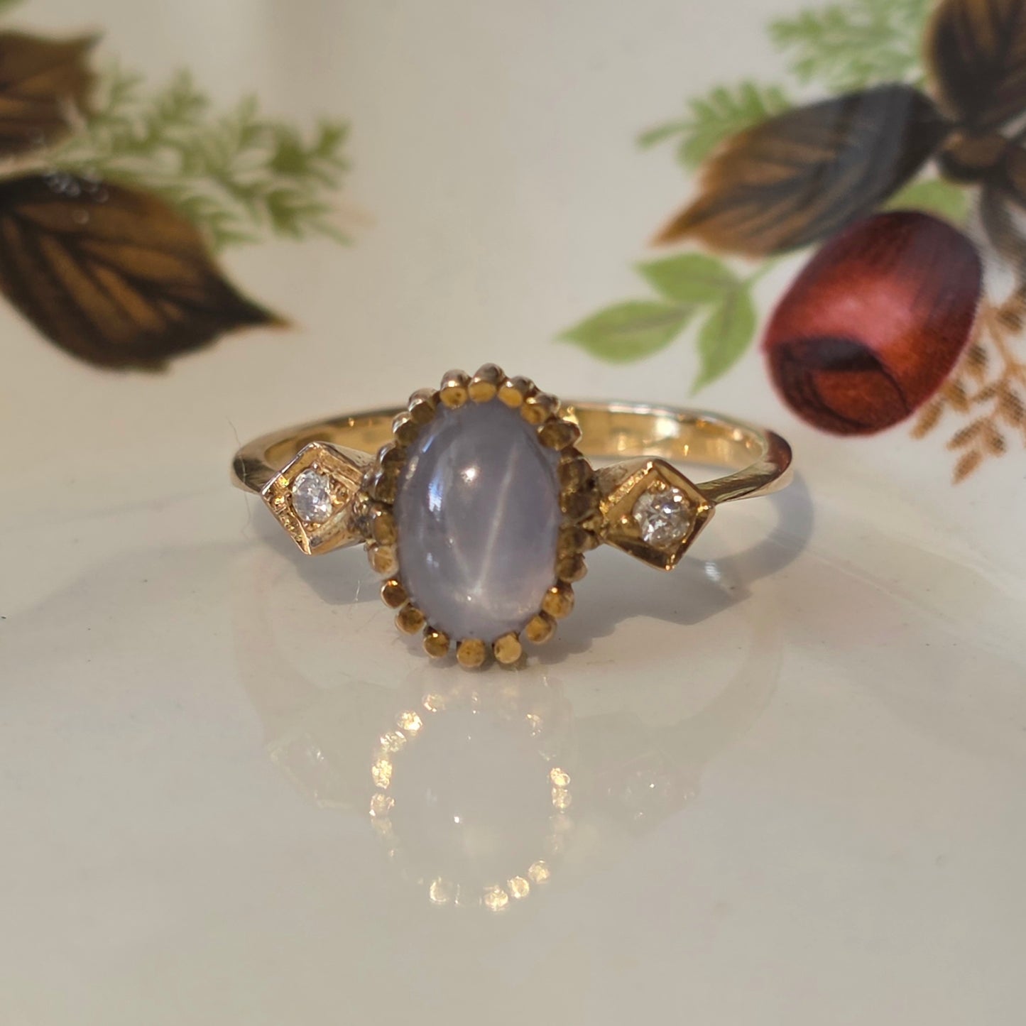 Vintage 14k gouden ring met ster saffier en diamanten
