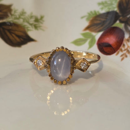 Vintage 14k gouden ring met ster saffier en diamanten