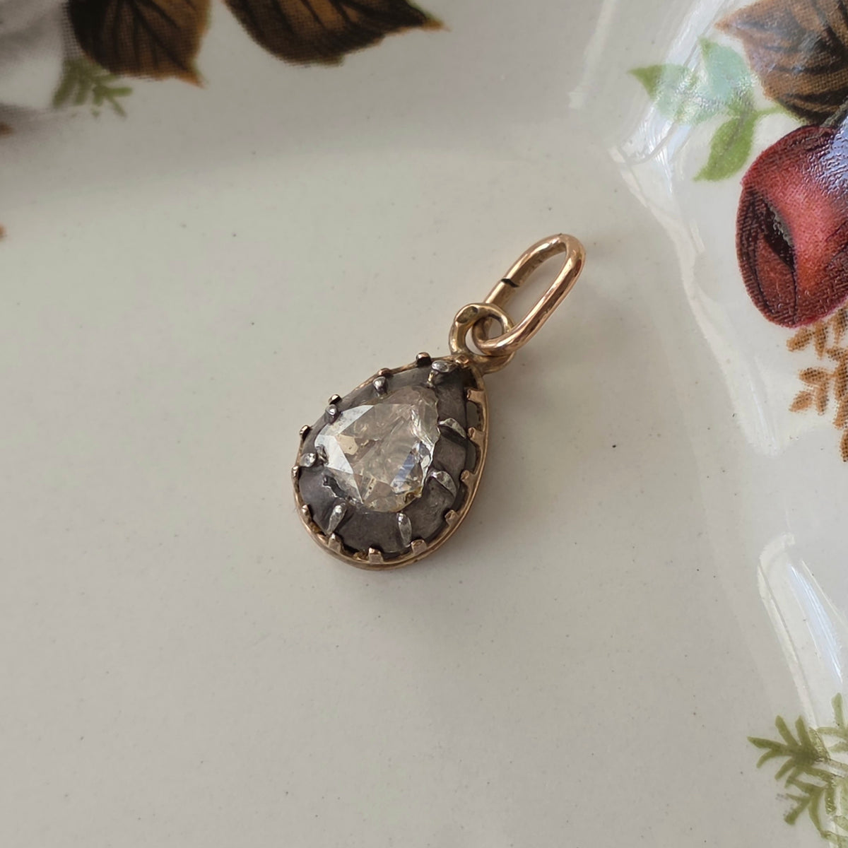 Antique 14k gold and silver pendant with a pear-shaped rose-cut diamond