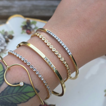 Vintage 14k gouden bangle armband met 13 diamanten