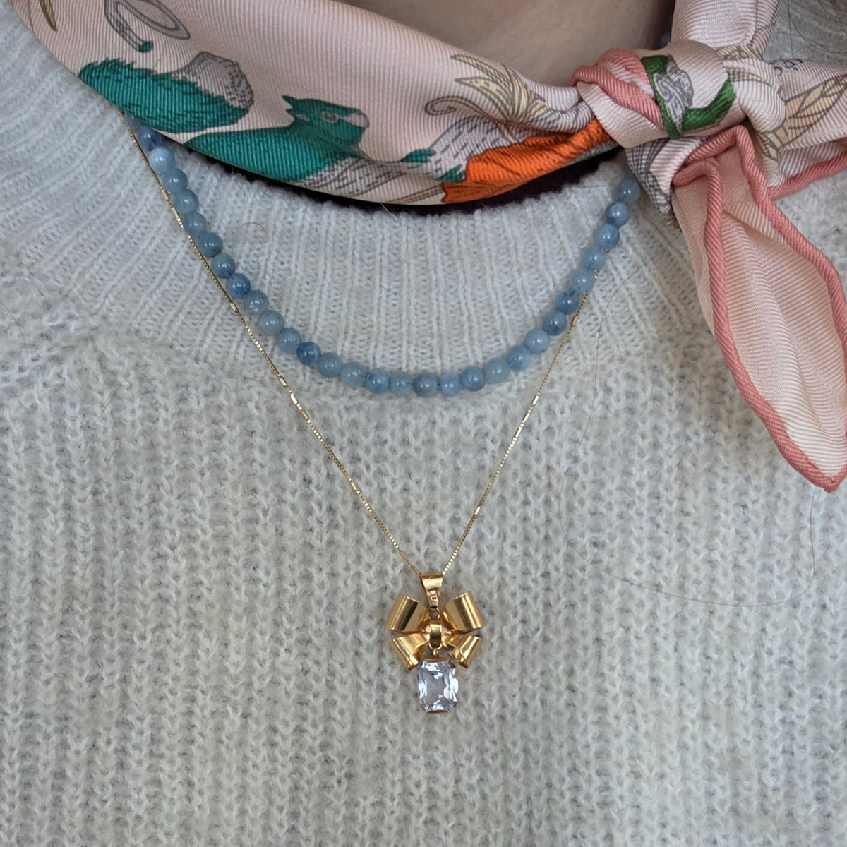 Vintage 18k gouden hanger strik met aquamarijn