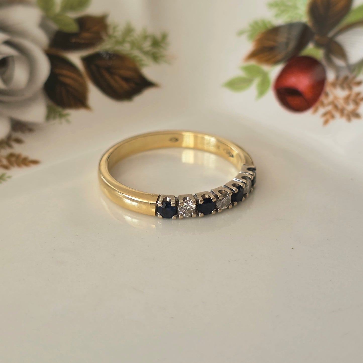 Vintage 14k gouden ring met saffier en diamant 0.12ct