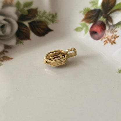 Vintage 14k gouden hangertje diamant en robijn