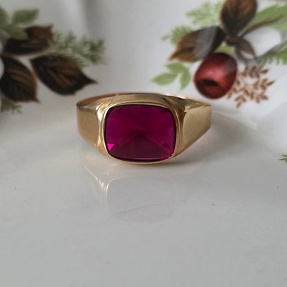 Vintage 18k gouden zegelring met robijn