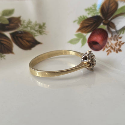 Vintage 14k gouden ring met diamanten bloem 0.2ct